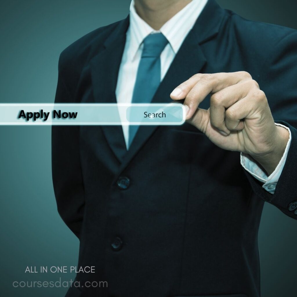 Businessman clicking "Apply Now." Formal attire, focused gesture. Background with smooth gradients. Website URL displayed below. Modern, engaging design elements.