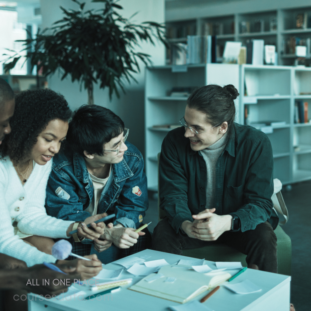 Group collaborating in cozy space. Students engaging with papers. Bright, modern library background. Diverse individuals sharing ideas. Laptops, notes scattered on table.