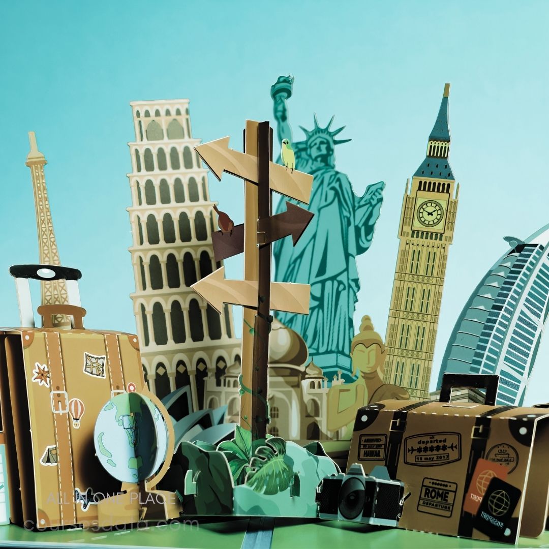 Travel-themed paper models display. Landmarks: Eiffel Tower, Leaning Tower. Statue of Liberty, Big Ben. Directional sign with arrows. Vintage suitcase and globe.