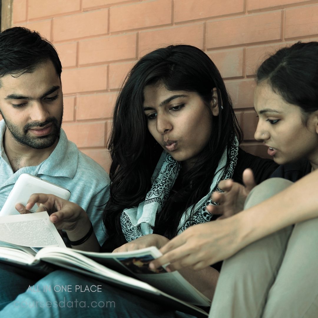 Three friends discussing a book.
