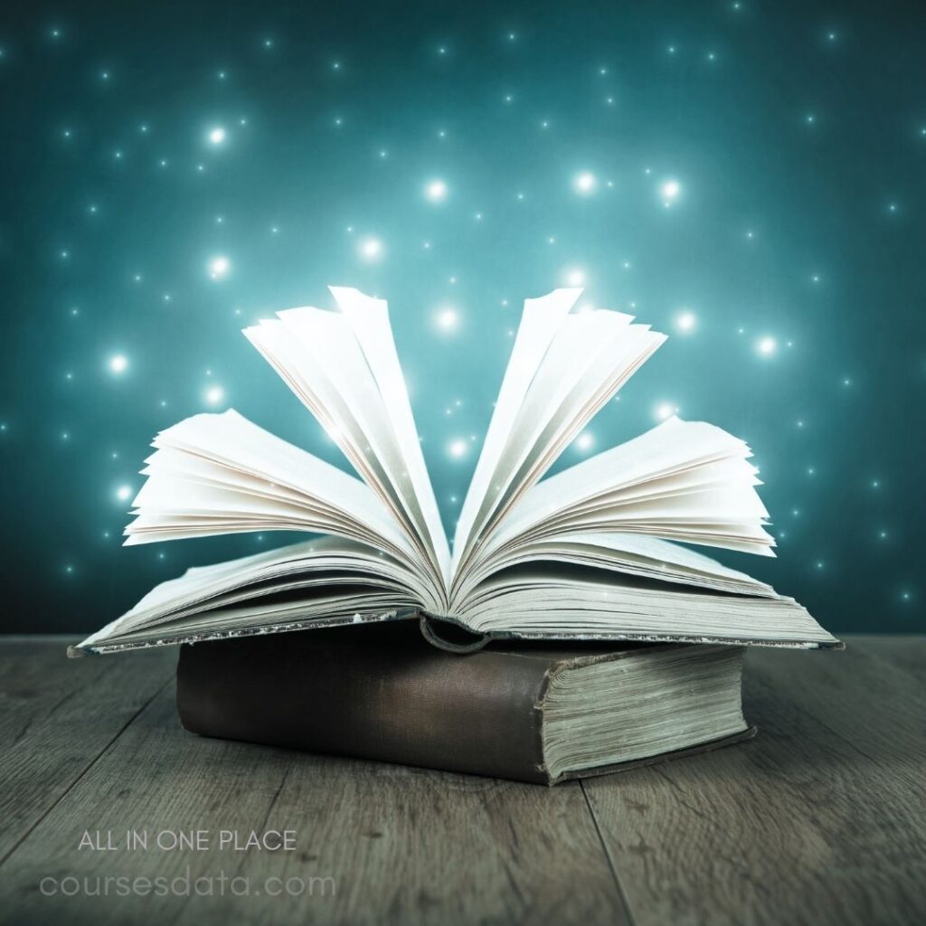 Open book with glowing stars.