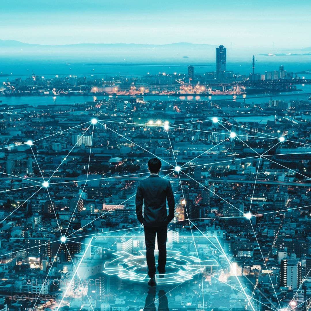 Businessman overlooking cityscape network.