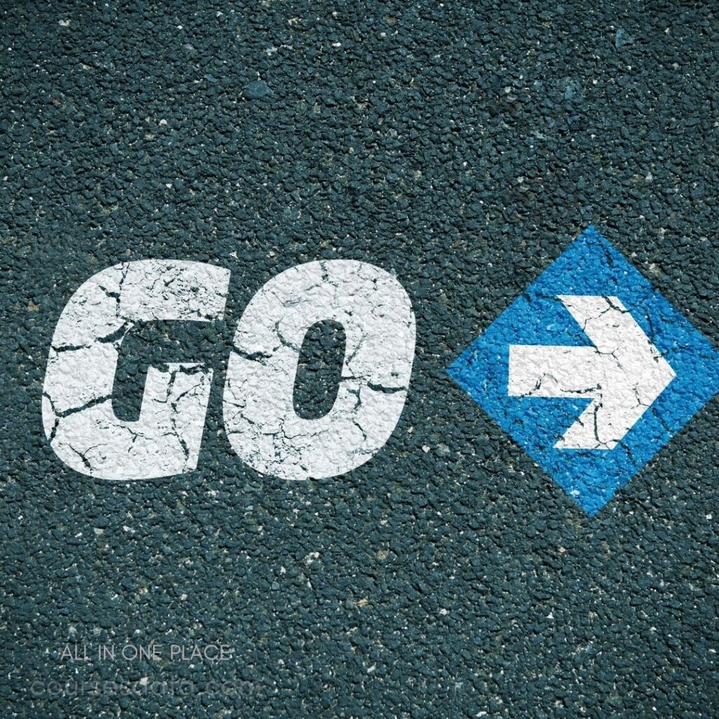 "Go" text on asphalt. Blue directional arrow. Cracked white lettering. Text on dark pavement.