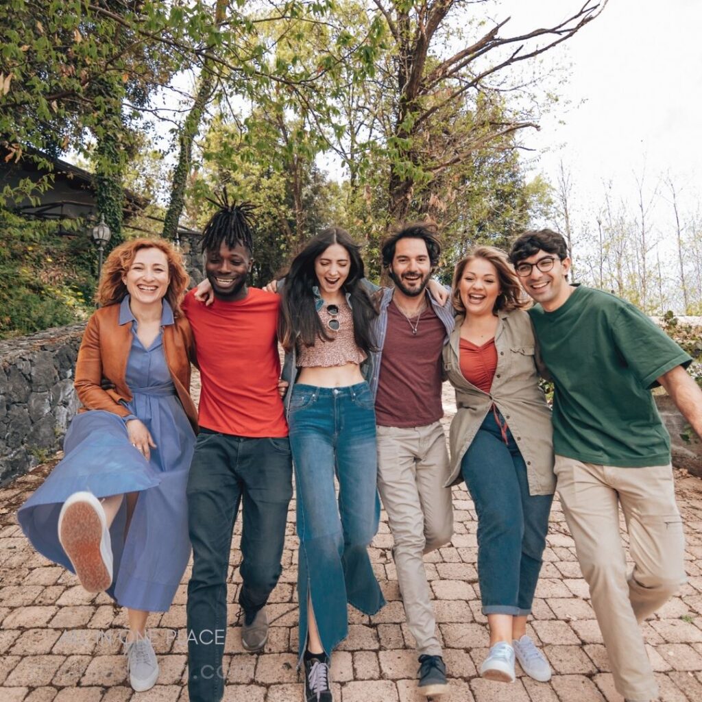 Group of friends walking joyfully.