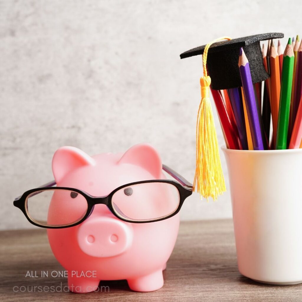 Piggy bank with glasses, graduation hat.