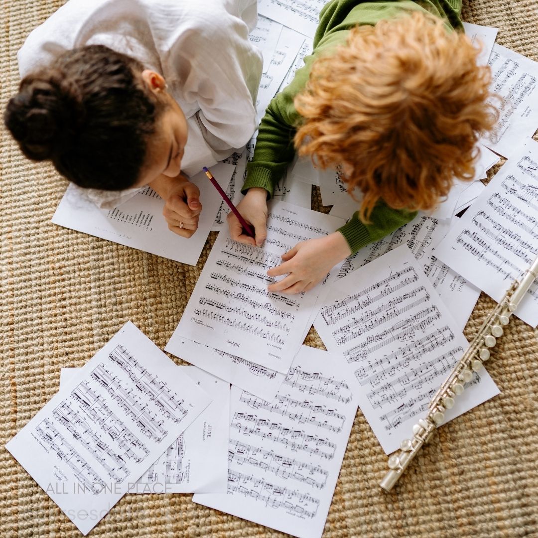 Children studying music together.