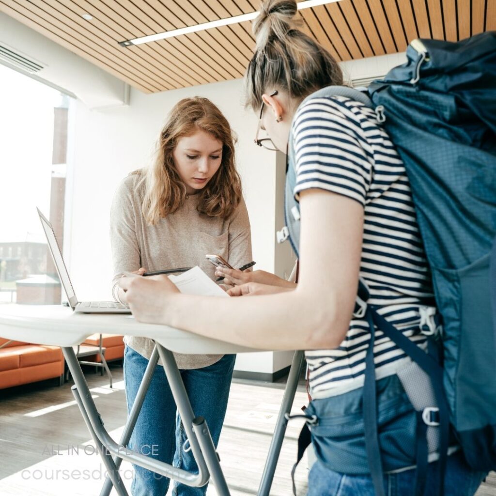 Students collaborating at a table.