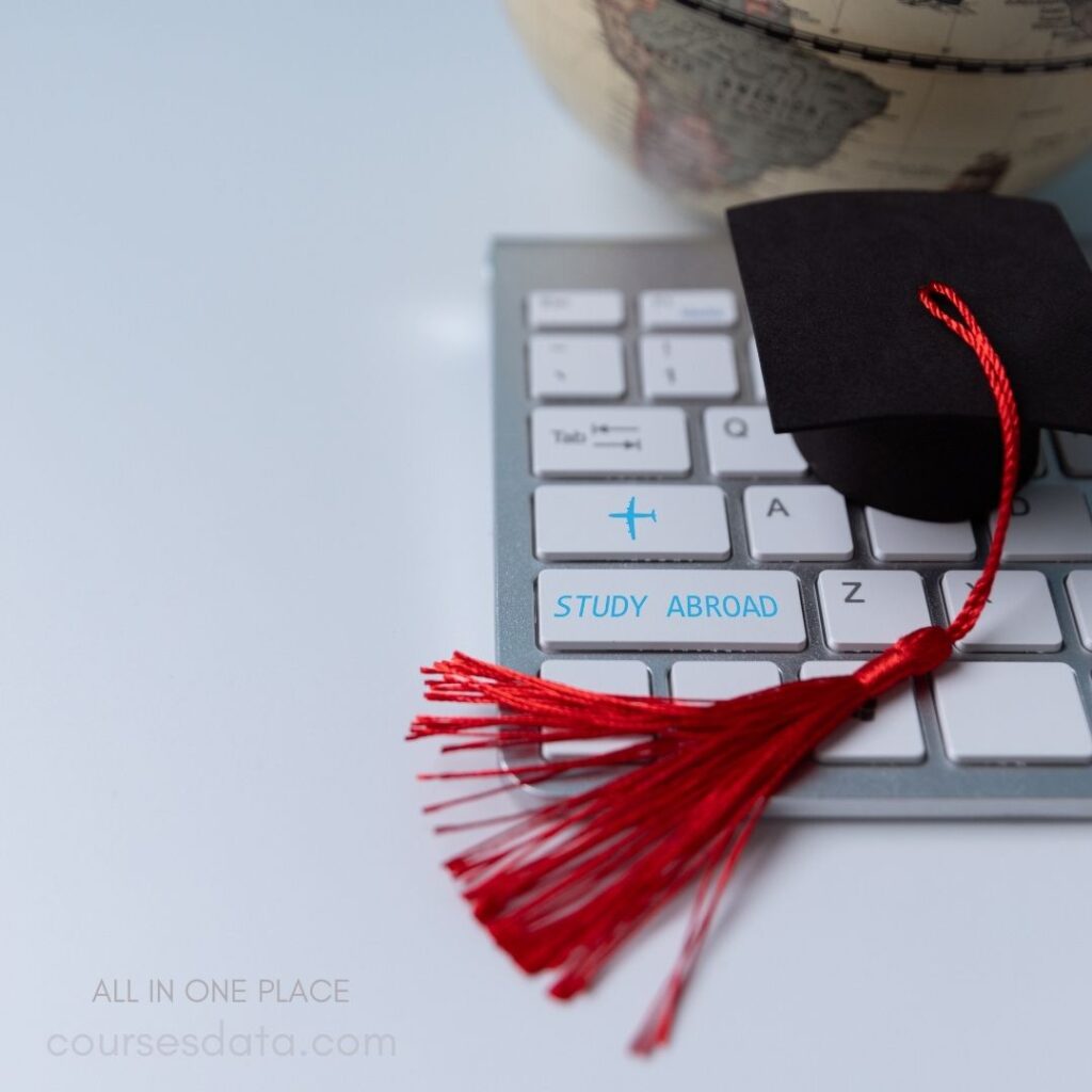 Graduation cap on keyboard.