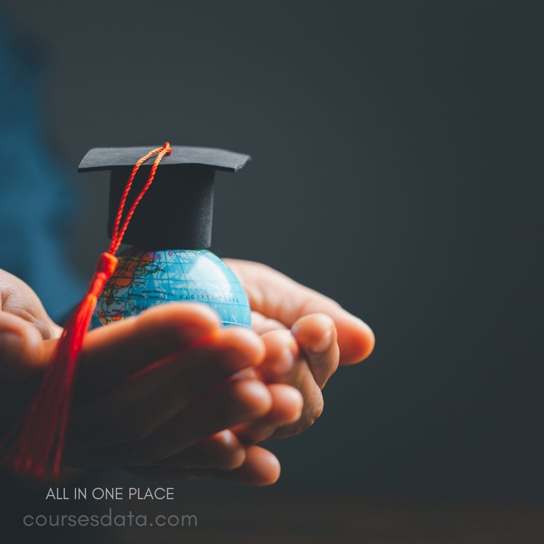 Graduation cap on globe model.