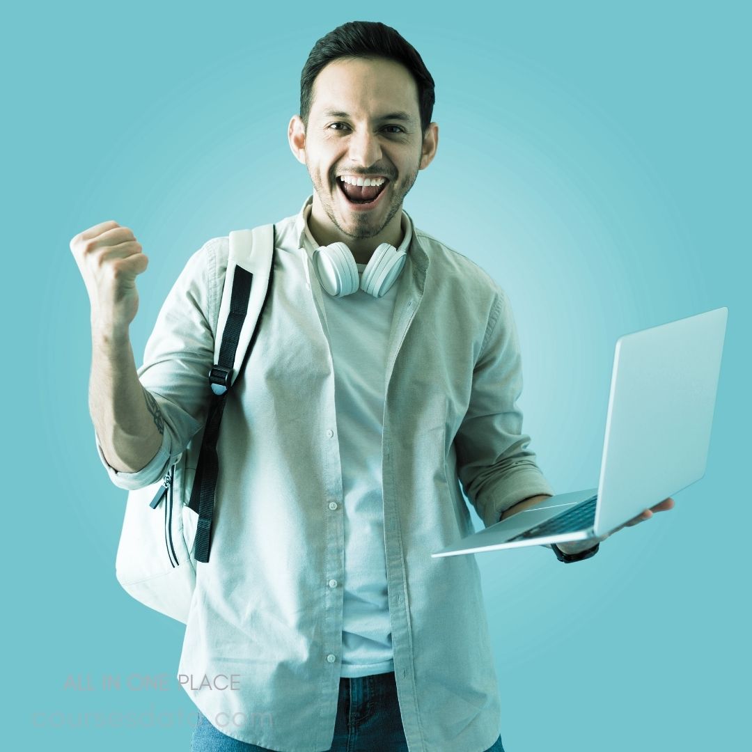 Cheerful man with laptop, headphones.