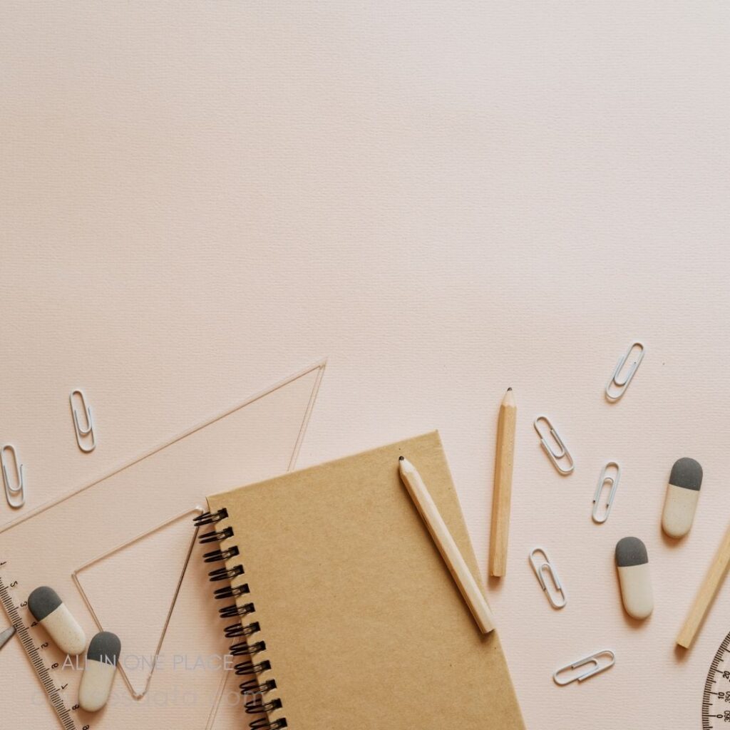 Stationery items on flat surface.