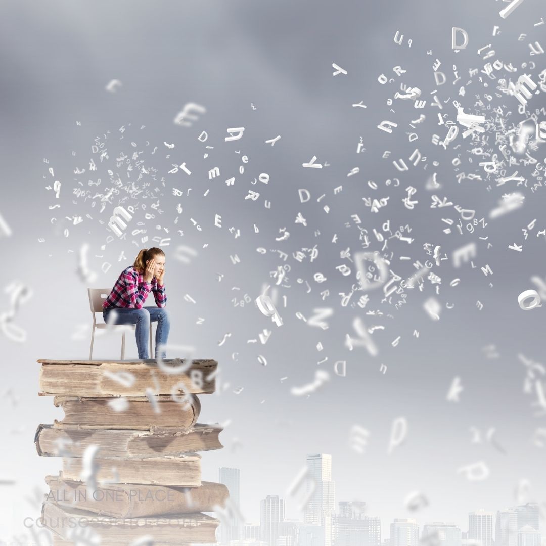 Girl seated on stacked books.