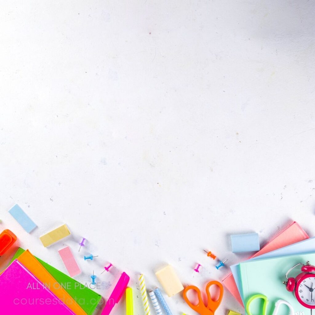 Colorful stationery on white surface.