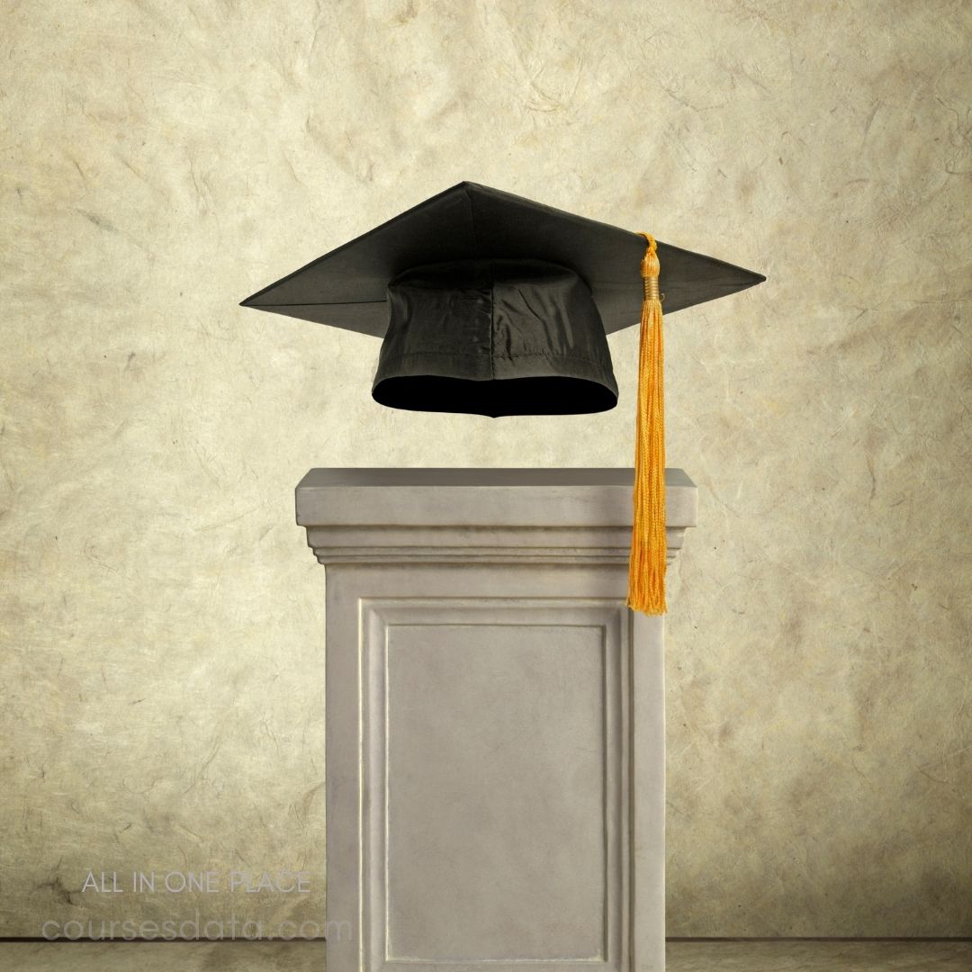 Graduation cap on pedestal.