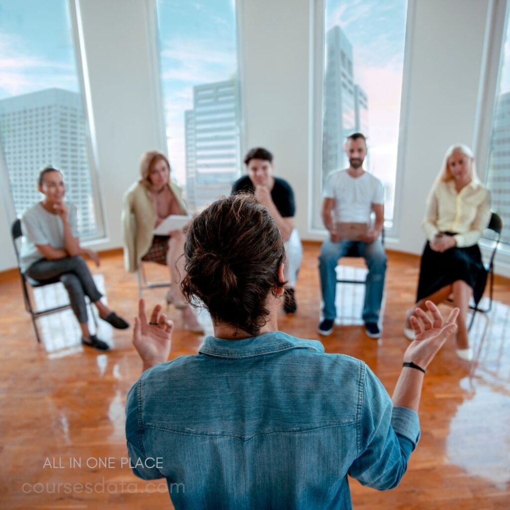 Group discussion in modern setting.