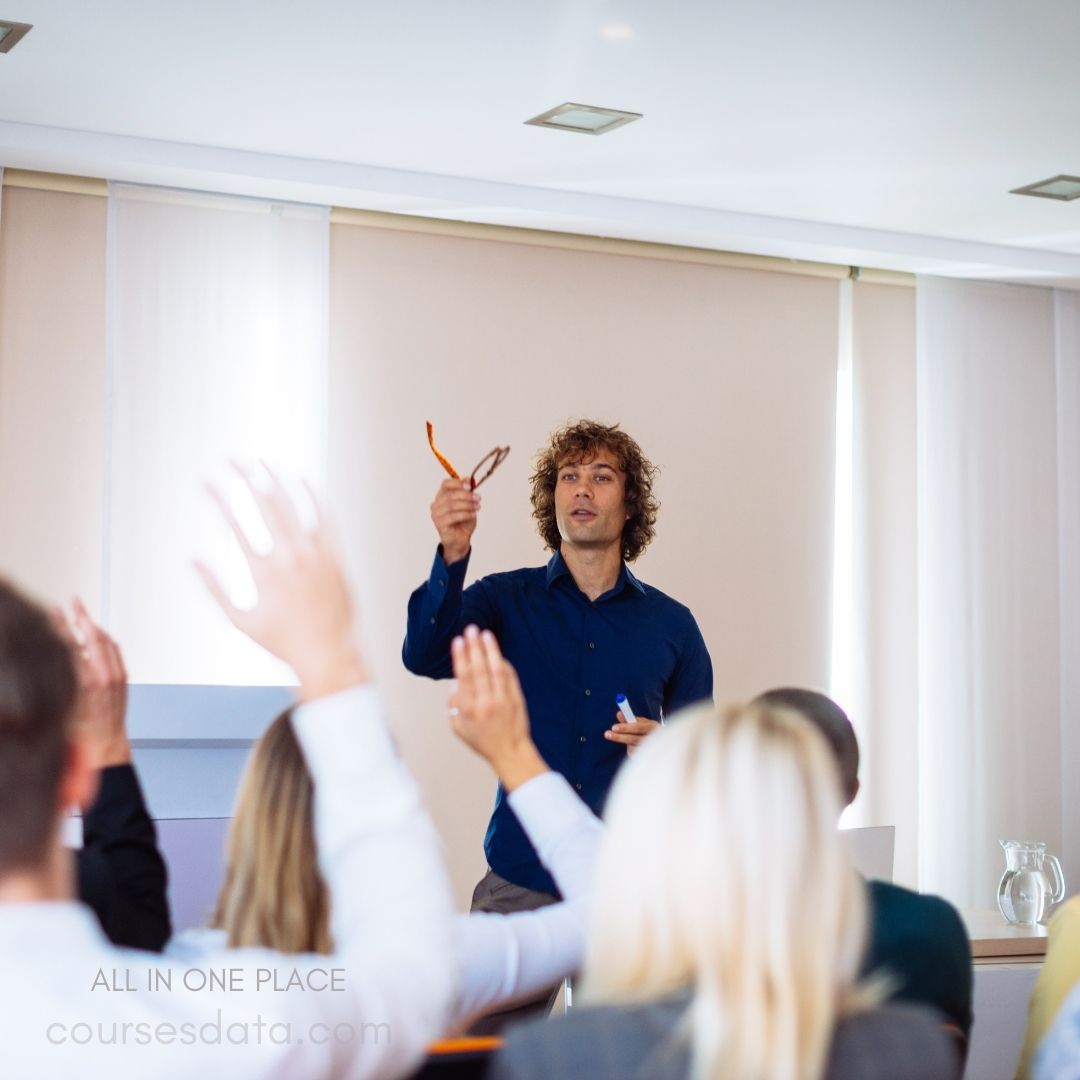 Instructor engages attentive audience.