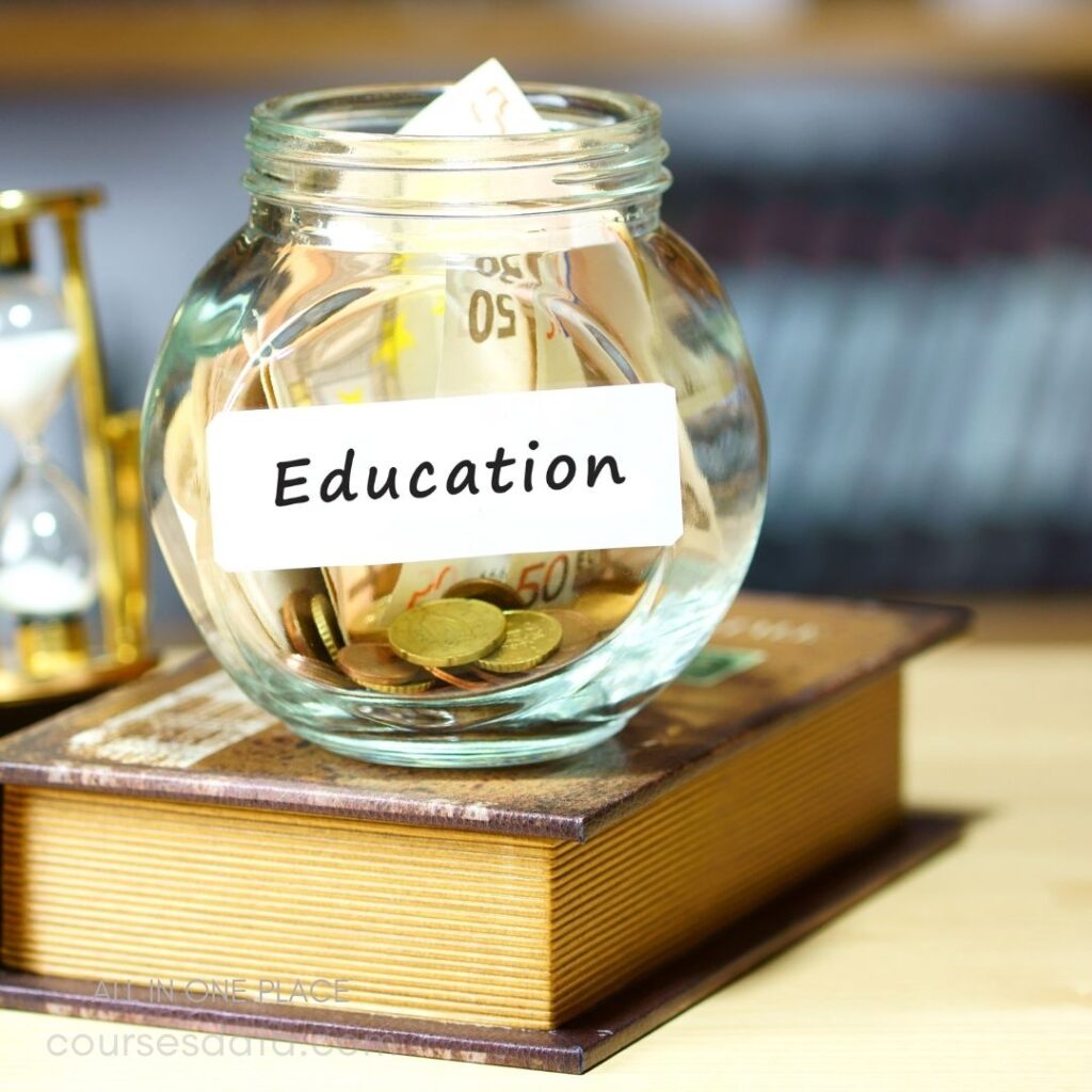 Glass jar labeled "Education" with coins.