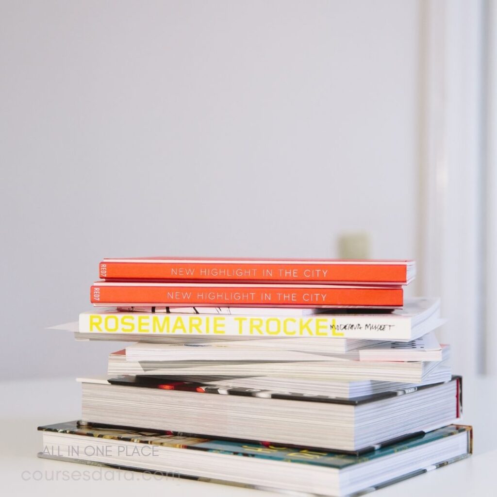 Stack of colorful books displayed.