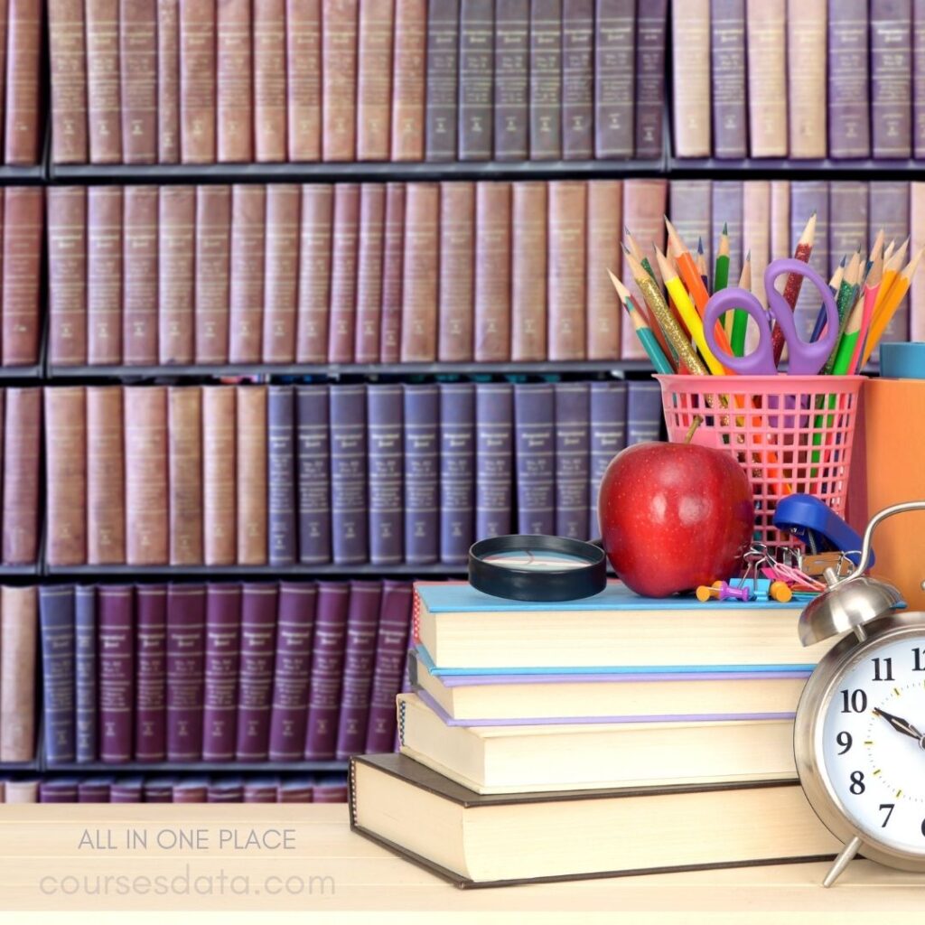 Books, stationery, and clock arrangement.