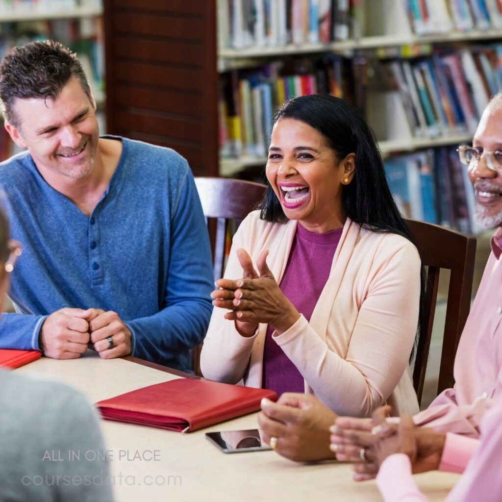 Joyful group discussing ideas.