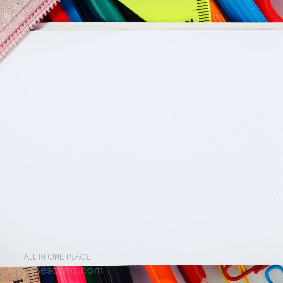 Colorful stationery on white background.