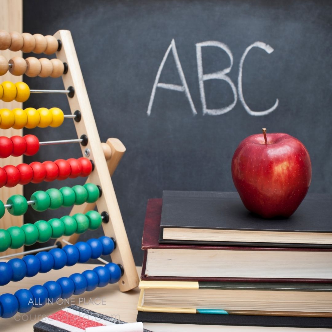 Colorful abacus, books, apple.