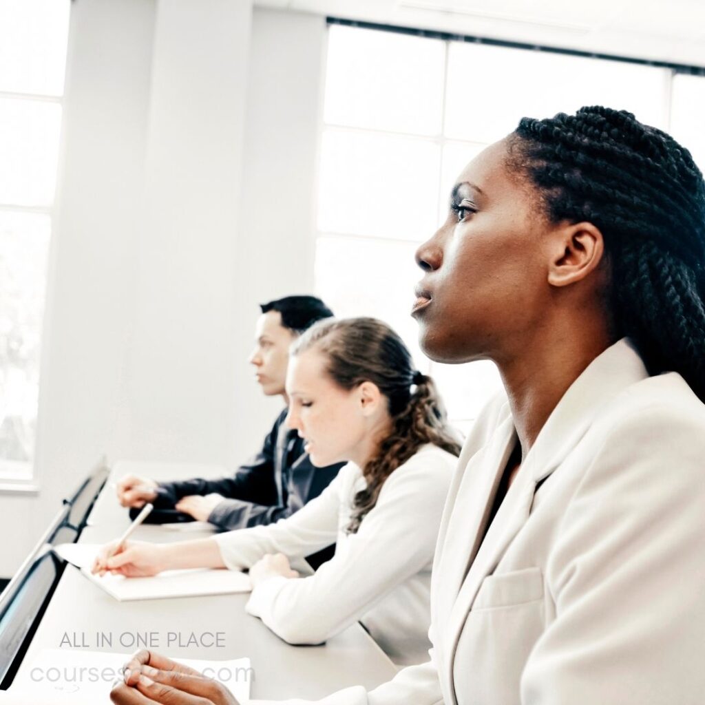 Focused individuals in a meeting.