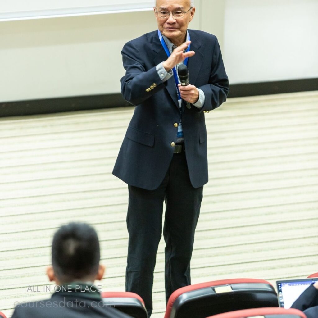 Presenter speaking to audience.