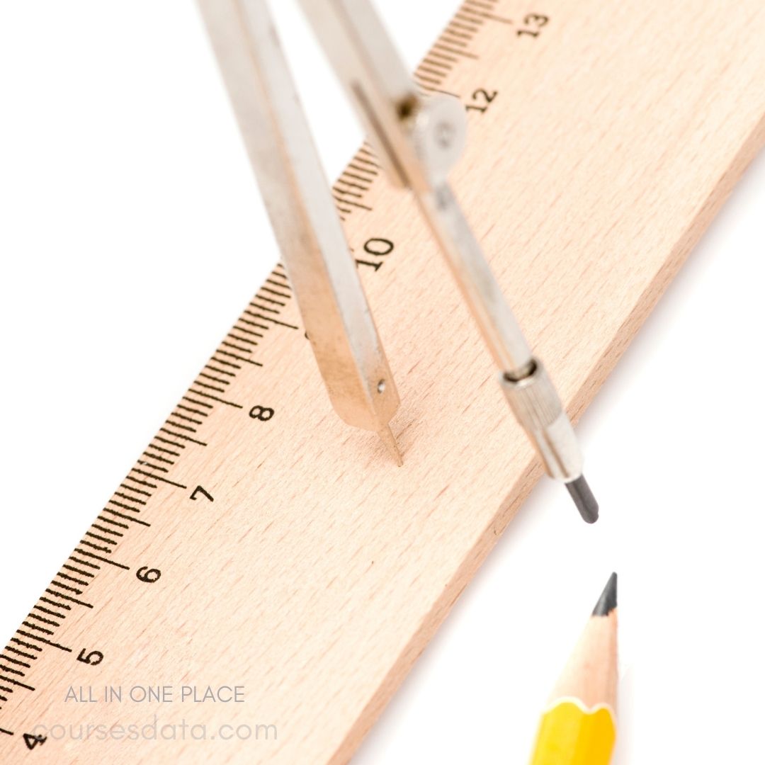 Compass on ruler with pencil.