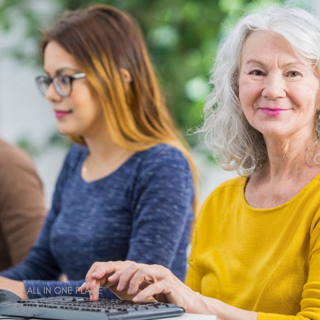 Women working on computers together.