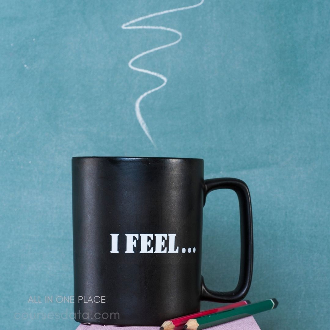 Black mug with "I FEEL..."