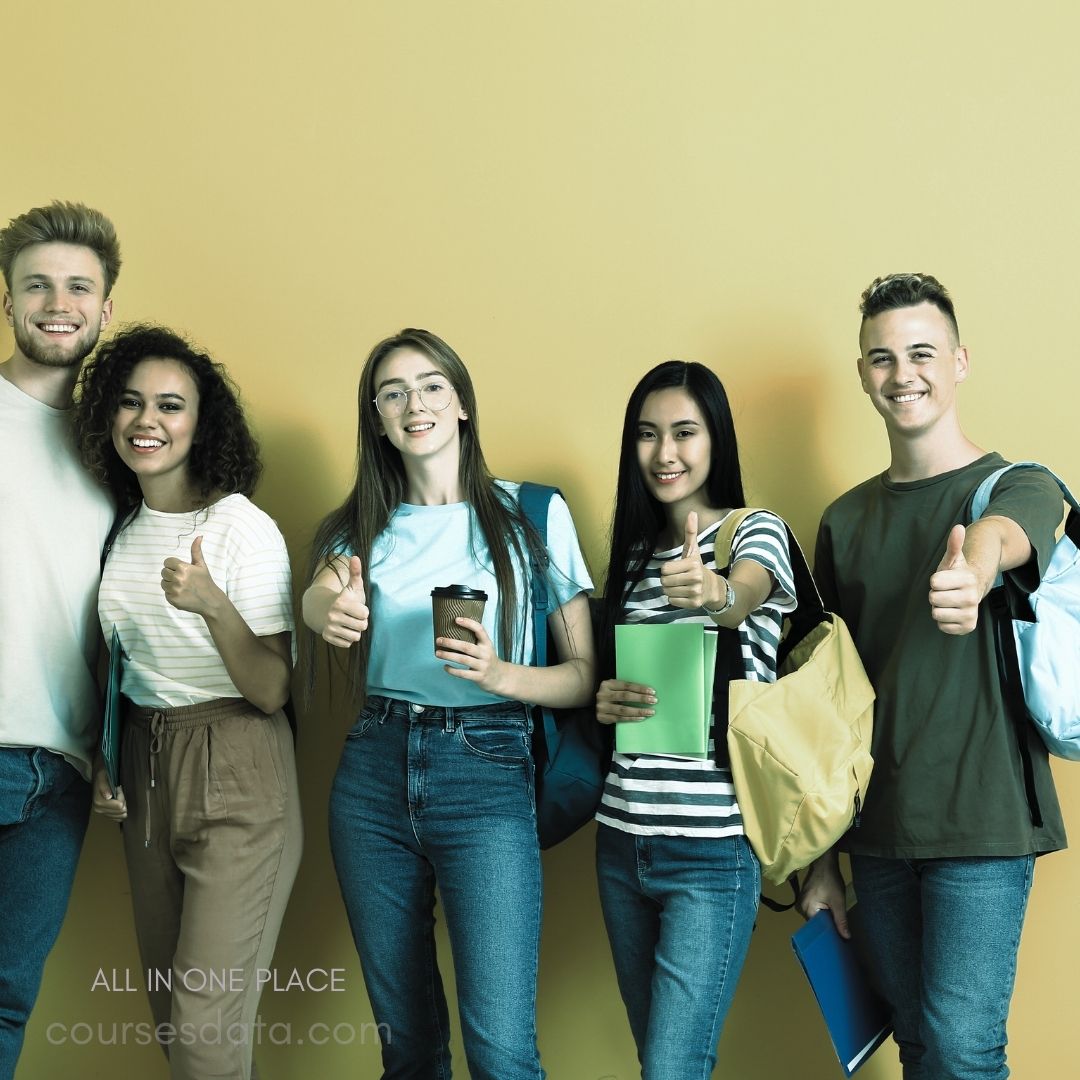 Group of happy students posing.