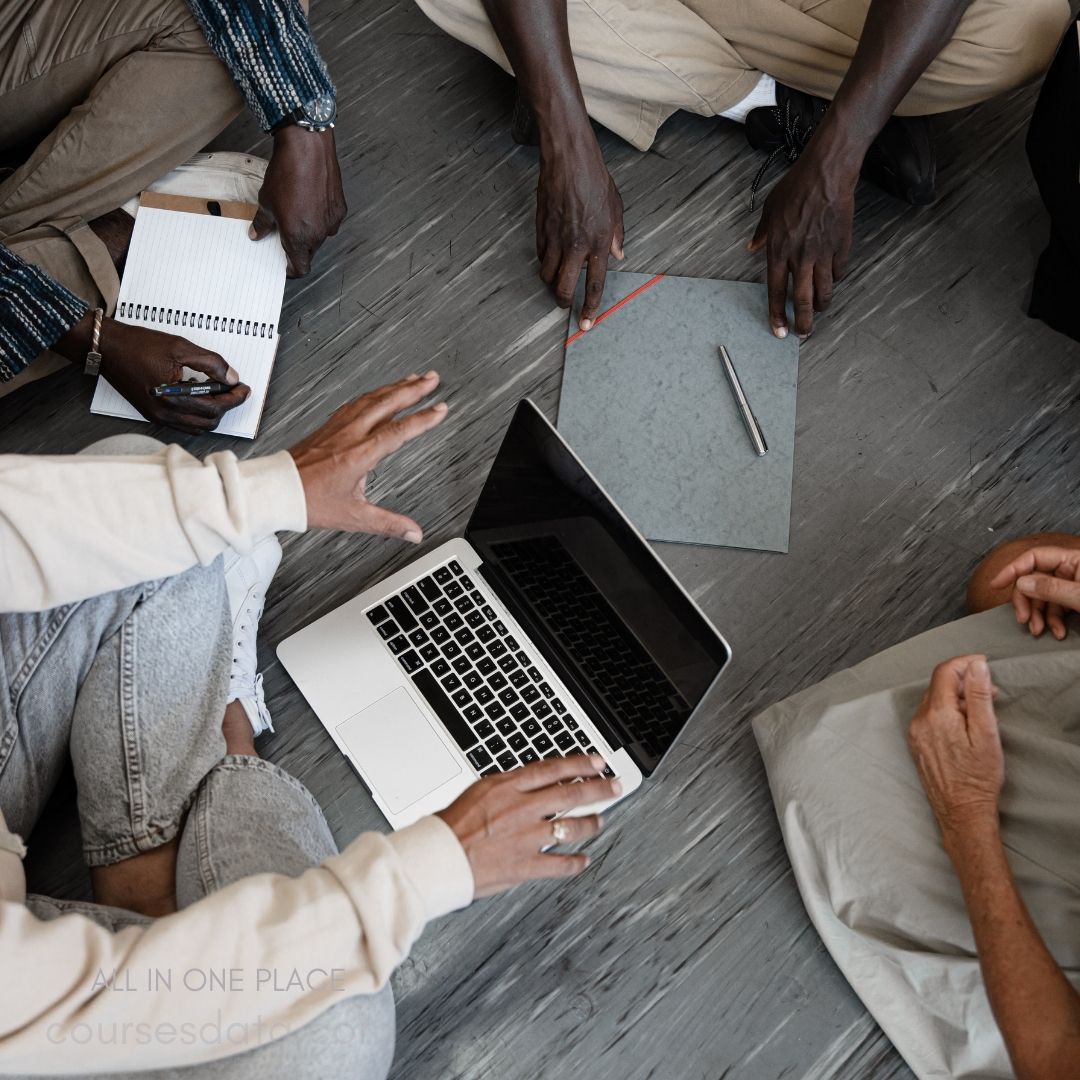 Collaboration around a laptop.