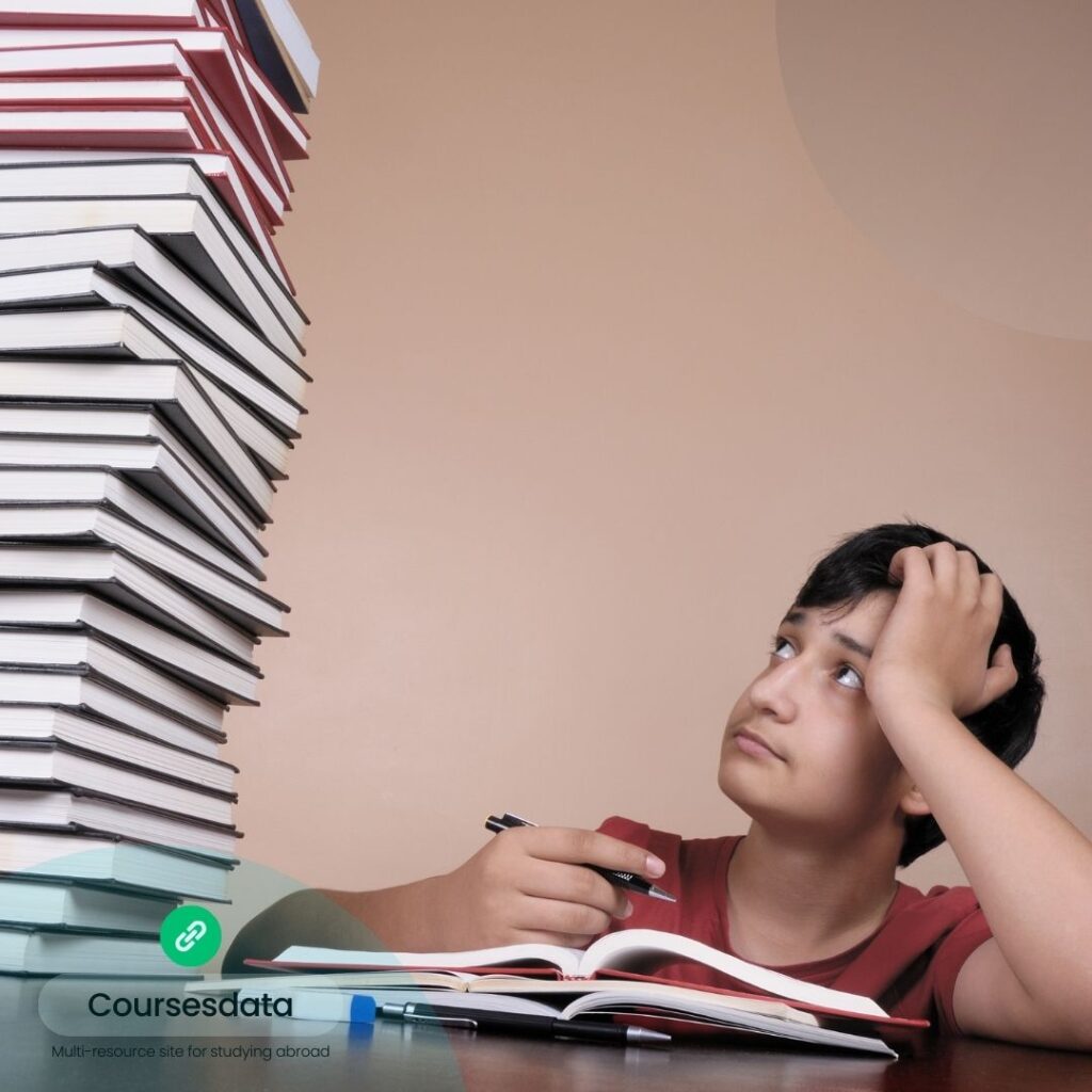 Stressed student with stacked books.