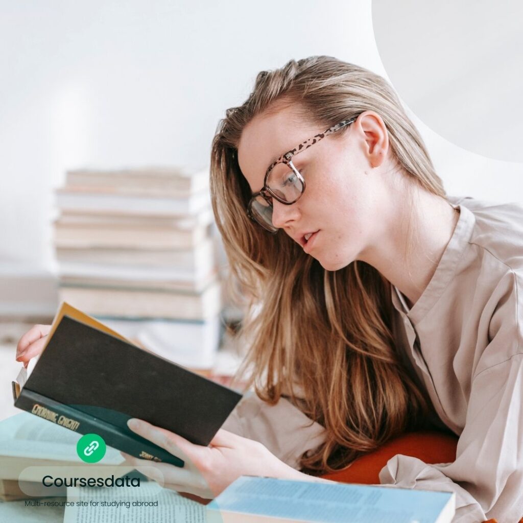 Woman reading book thoughtfully indoors.