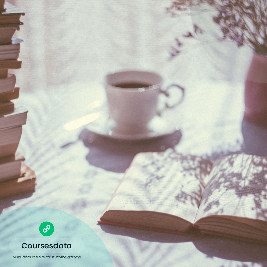 Books, coffee, sunlight, minimalist setting.