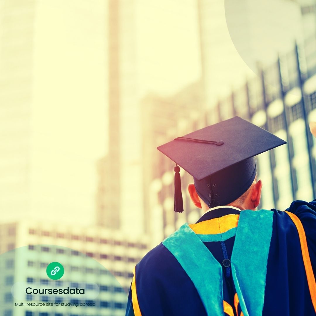Graduate wearing cap and gown.
