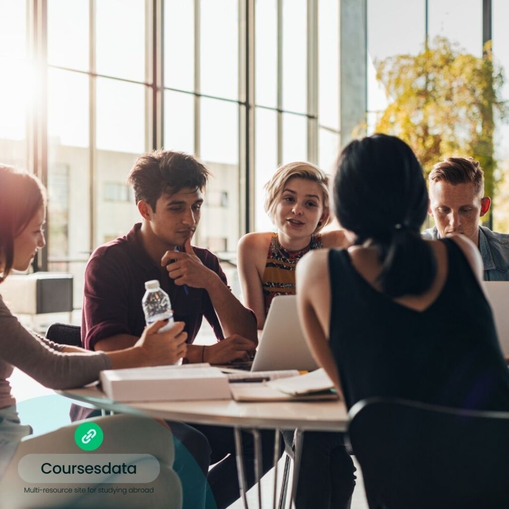 Group discussing around table.