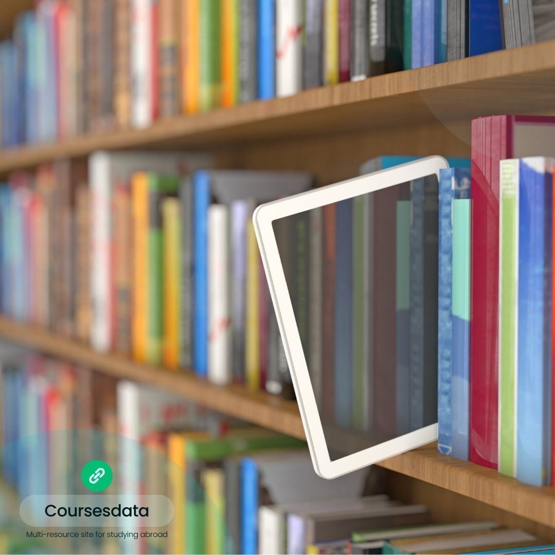 Tablet among colorful bookshelves.