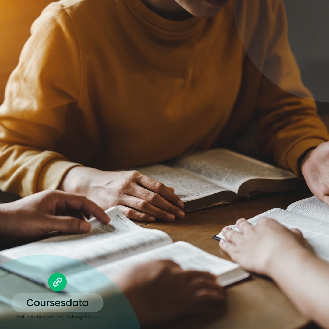 Group studying with open books.