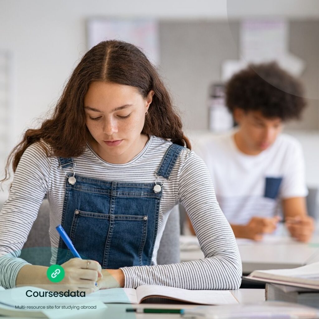 Student studying in classroom setting.