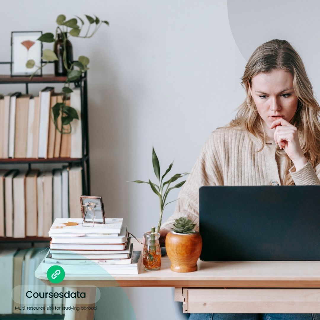 Woman working at desk.