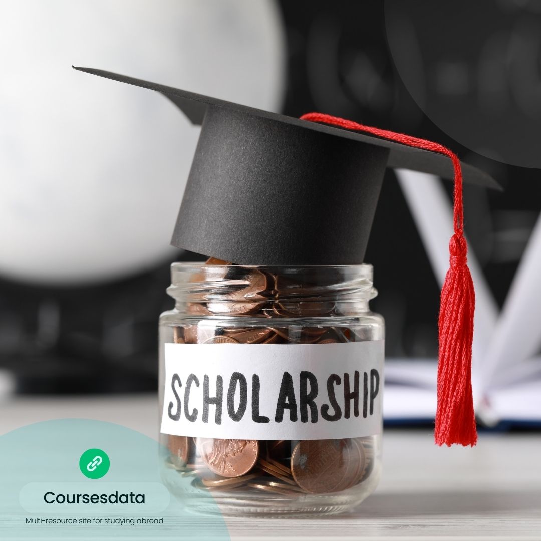 Scholarship jar with graduation cap.