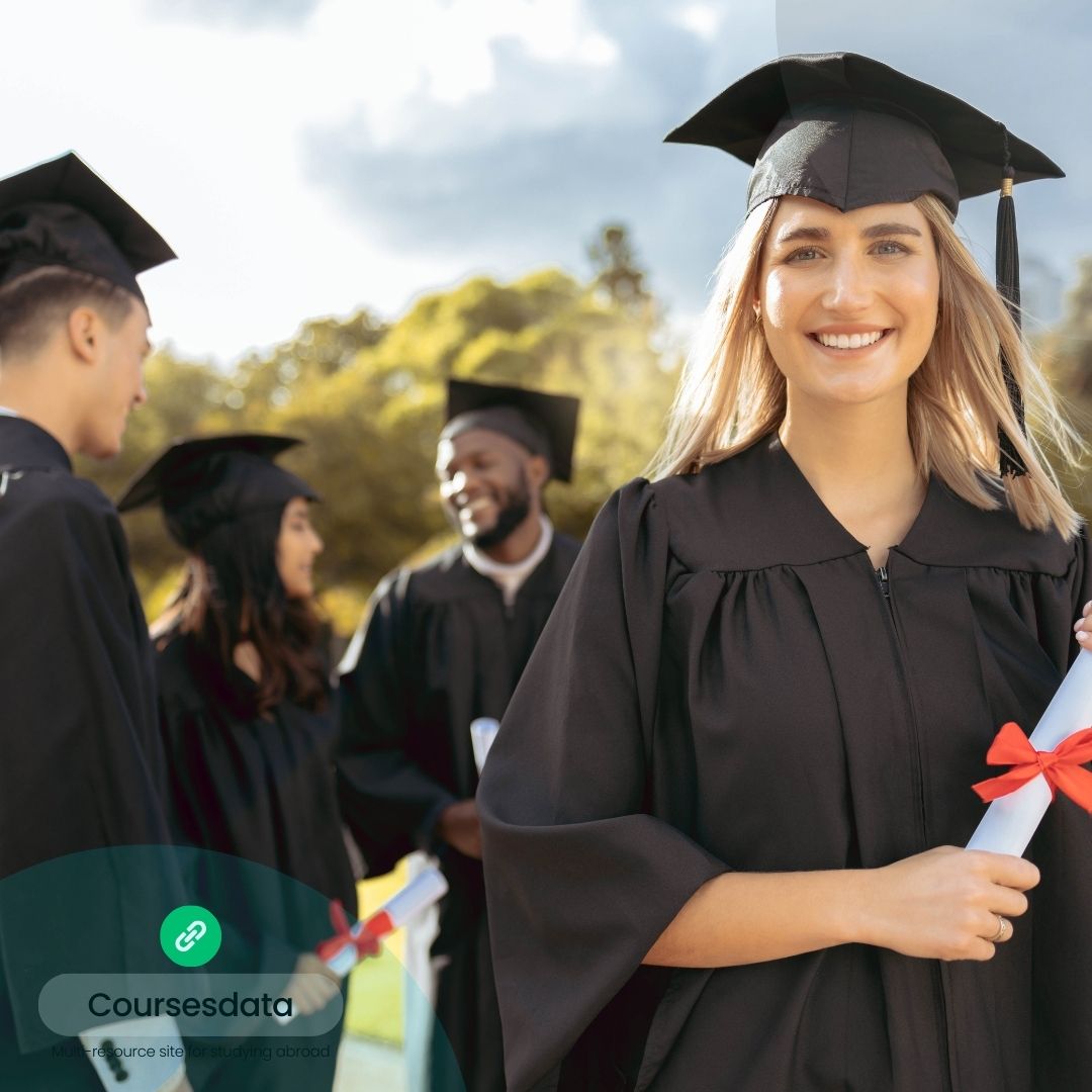 Graduation celebration with graduates smiling.