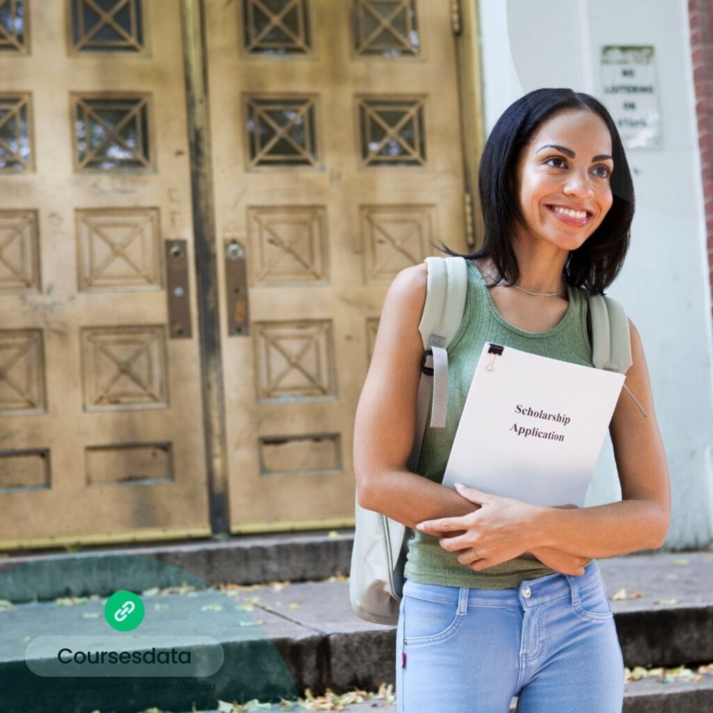 Smiling woman holding application form.