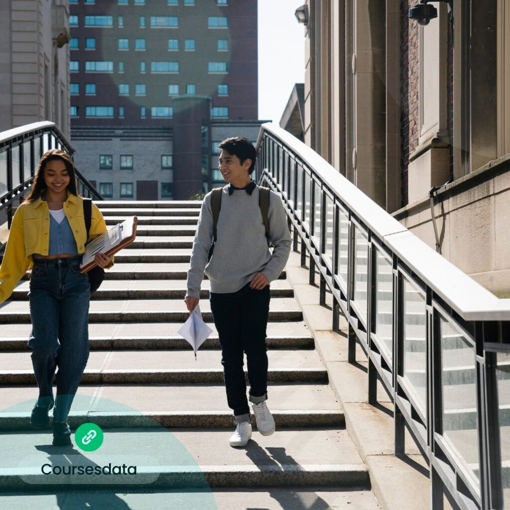 Students walking down stairs.