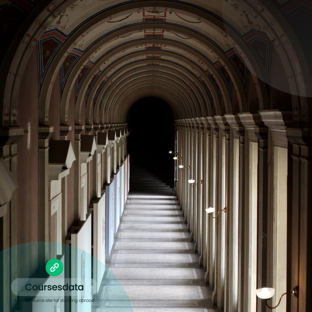Dimly lit architectural corridor.