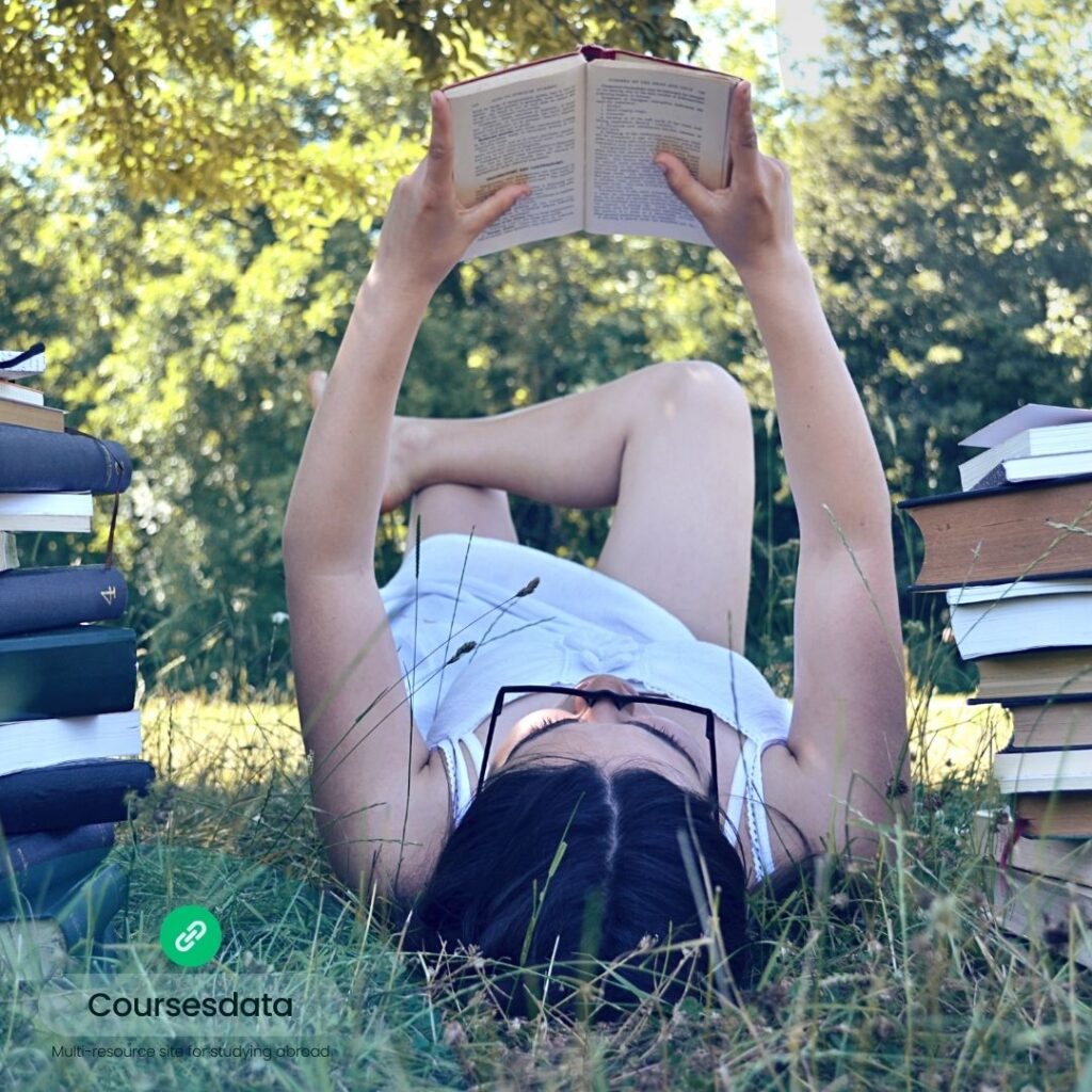 Person reading under a tree.