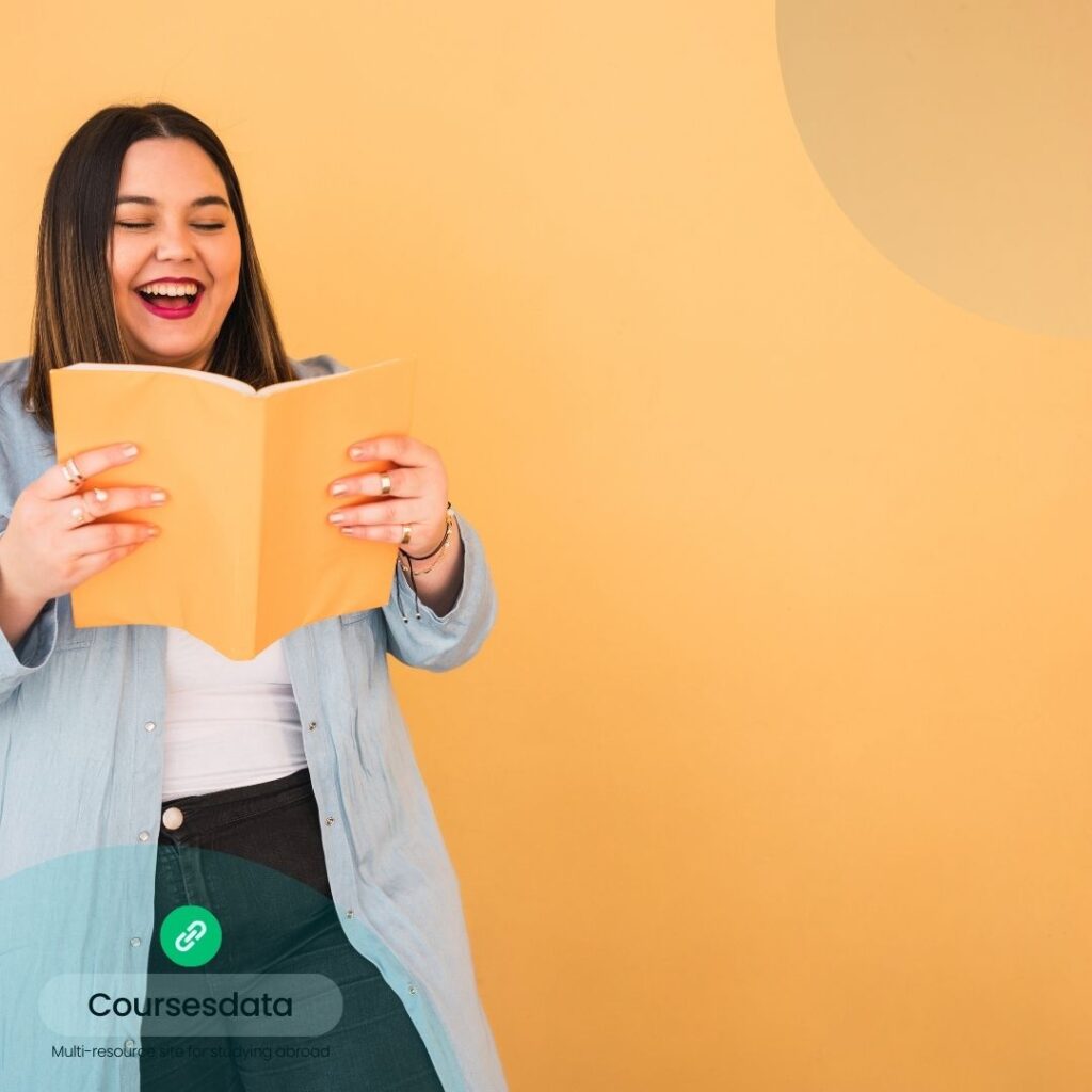 Smiling woman reading book joyfully.