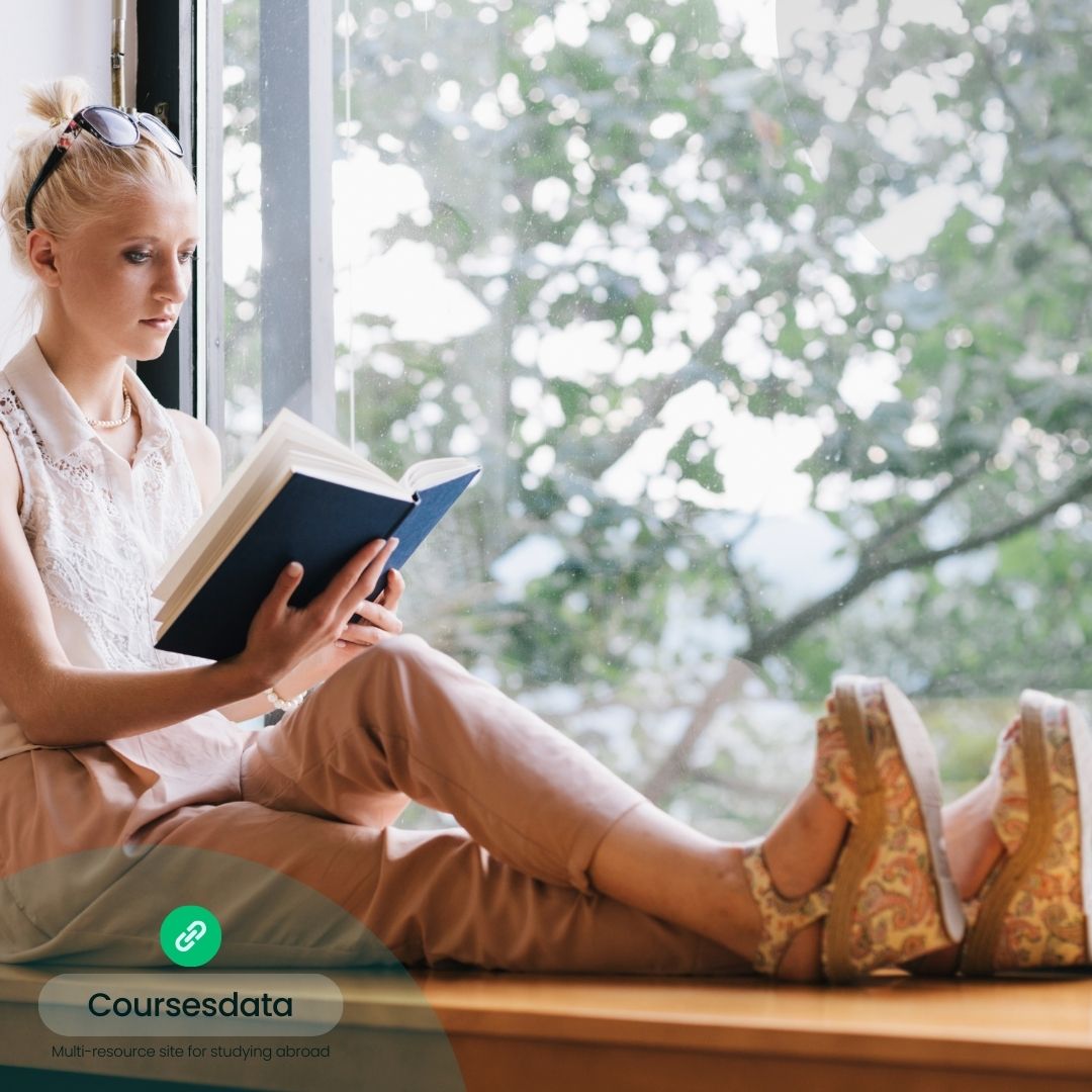Woman reading by window.